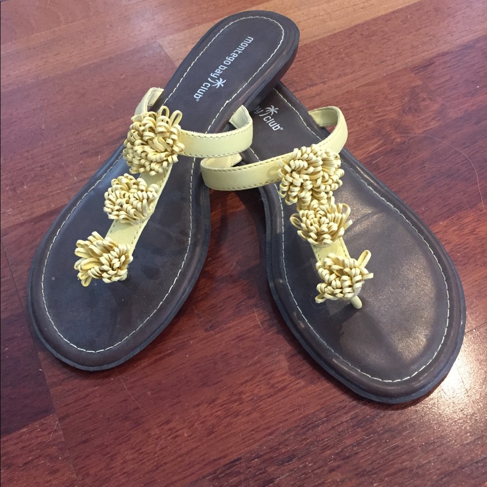 Soft yellow slip on sandals